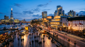 A high-quality, professional wide-angle shot of a vibrant urban city center at dusk, featuring a ble