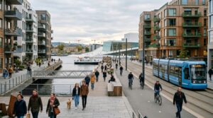A professional editorial photograph of a modern Norwegian urban landscape featuring a blend of resid